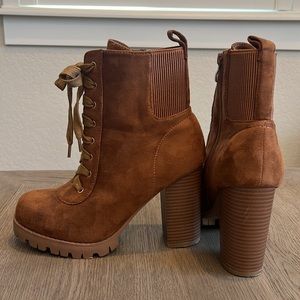 Lace up heel boots. Size 9